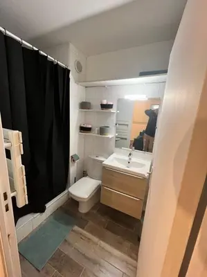 Un ou plusieurs lits dans un hébergement de l'établissement grand studio proche plage